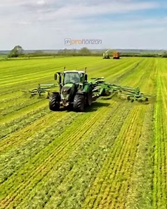 The FENDT 720 Vario tractor working in the field bringing grass together with the Krone swadro rakes before the forage harvester collects it | Pro Horizon Farming Content