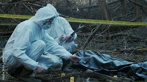 Detectives collecting evidence in a crime scene. Forensic specialists making expertise. Police officers and investigation.