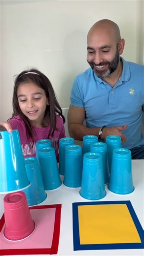 Tracy on Instagram: "Colorful Cup Challenge with Dad 🙌 Watch them match the cup colors to the squares! 🩷 💛 #Challenge #fy #viral"