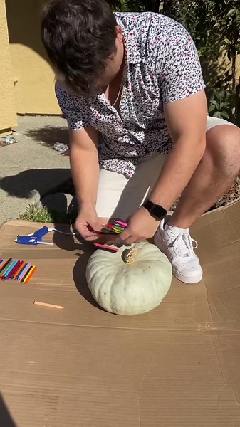Viral pumpkin DIY using 100 crayons melting rainbow effect
