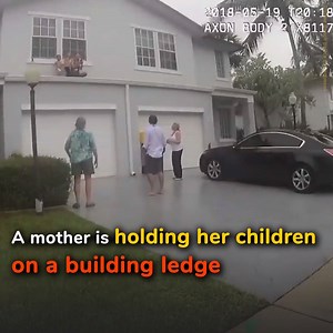 A mother is holding her children on a building ledge 😢💔 | Sharing is Caring