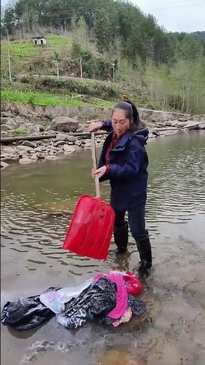 Rural Life's Hilarious Laundry Day: A Woman's Wash by the River