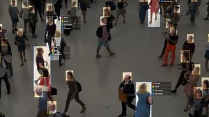 Crowded building with commuters walking. Artificial intelligence and facial recognition are used for surveillance purposes. Individual data showing sex, race and clothing. Deep learning. Futuristic.