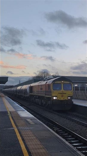 Freightliner Orange 66623 powers past Chesterfield with a rake of tankers #class66 #shorts #railway