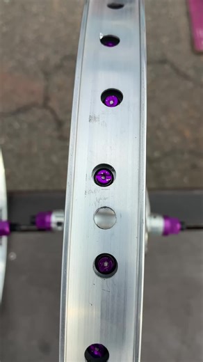tnt derringer hubs laced up to tnt block buster rims with purple bits #bmx #bmxshop #richmondva #tntbmx #bmxlife