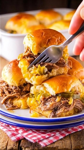 There’s something magical about a slow cooker and the way it turns a simple chuck roast into pure comfort food. These Mississippi Pot Roast Sliders will have everyone gathered around the table, asking for seconds—and trust me, they won't last long! Full recipe’s in the comment 👇 | Recipes & Cooking Guide