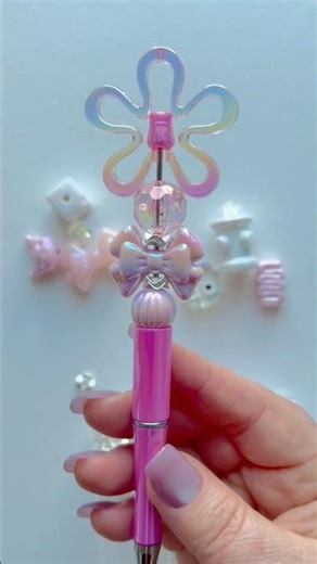 Is it a bow or a flower pen? #beadedpen #beads
