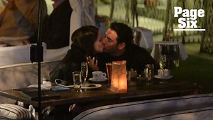 Matt Harvey cuddles and kisses Adriana Lima