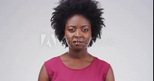 Face, comedy and funny with an african woman in studio on a white background for freedom, humor or laughter. Portrait, smile and a happy young black person laughing at a meme, joke or crazy good news