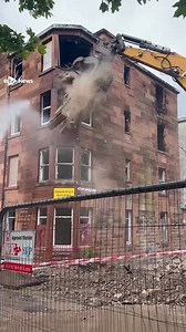 Watch as first block of flats at 'Scotland's Chernobyl' demolished. Bulldozers have moved in on the rundown Clune Park estate in Port Glasgow after Inverclyde Council deemed buildings to be dangerous. https://i.stv.tv/4mHeeUW | STV News