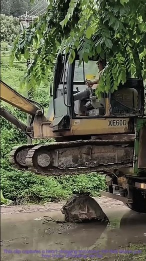 Excavator Fail: Offloading Mishap Caught On Camera