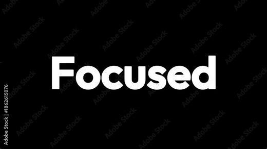 Bold white text displaying the singular powerful word focused against a deep black background emphasizing concentration and clarity for any project.