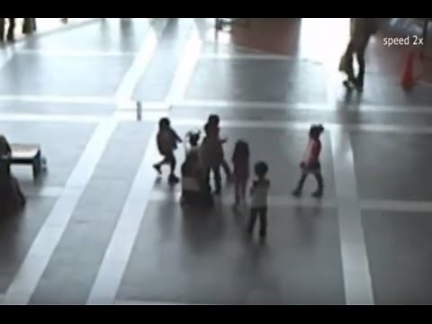 Robot Tries to Escape from Children's Attack
