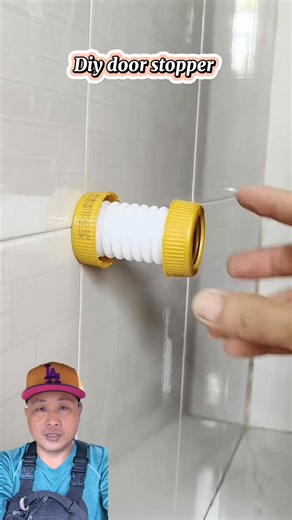 Homemade door stopper from a flexible hose #fblifestyle #diyprojects #huangboucreations | Huang Bou Creations