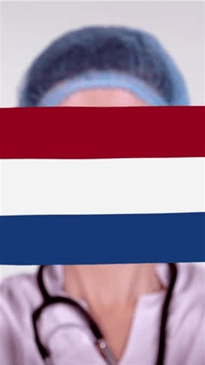 clip-4000829099-close-up-doctor-glasses-blue-medical-cap-gloves