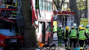 London bus crash: two critical and at least 30 injured