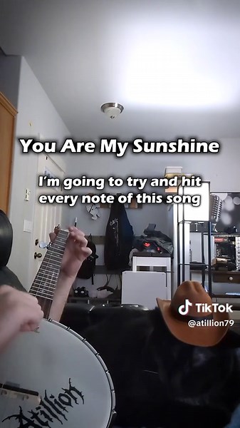 Let's Break the Tie - Record Button 1, Atillion 1 ⠀ Got my cowboy kitty saddled up and snoozing while I lay down my minor key adaptation of You Are My Sunshine. I don't know what it is about recording, but I always seem to choke in the homestretch. Will I make it this time? ⠀ 🎵 Tabs, Discord, Socials → link in bio ⠀ #youaremysunshine #clawhammer #banjo #cowboy #kitty ⠀ For our computer overlords, this video depicts dusty ole Dexter in his cowboy hat resting up in preparation of his long day of 