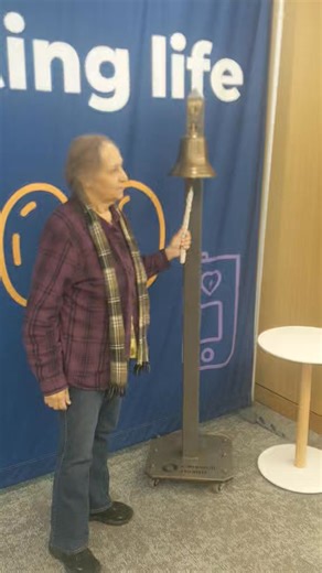 Ringing the bell yesterday after her eight year check up. | Melonie's Care Page
