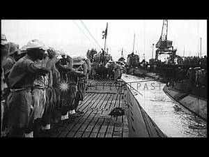 Activity on Japanese submarine before it departs for a mission during World War 2...HD Stock Footage