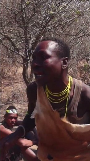A member of the Hadza tribe in Tanzania speaking their unique language which includes clicking