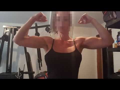 Natural female flexing muscles (biceps)