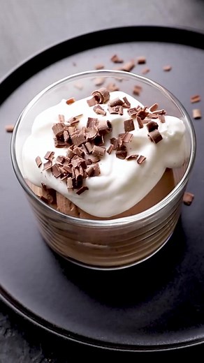 Consider this your one-stop guide for making the perfect chocolate mousse with just two ingredients (and no eggs!). Eating chocolate mousse is like diving into a pillow of chocolate. Its thick, fluffy, and rich in chocolate flavor. I like to top the mousse with fresh whipped cream. I like the contrast in taste between the rich chocolate mousse and the airy whipped cream topping! #blogger #food #foodblogger #dessert #michiganblogger #bakery #bakinggoals #ohmyyum #recipes #recipe #recipedeveloper 