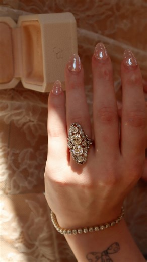 Andria Barboné Jewelry on Instagram: "This *chef’s kiss* of an antique ring is a testament to antique craftsmanship 🤌🏼 The Cassian Ring ~ an authentic Edwardian-era beauty ✨ Her swirling open metalwork and beautifully placed diamonds makes her an antique lover’s dream 💭💫 • • • #engagementring #antiquejewelry #omc #oldminecut #antiquediamonds"