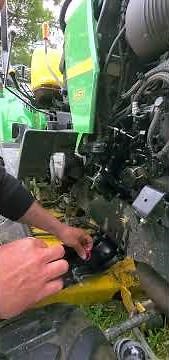 checking the fuel filter on the JOHN DEERE