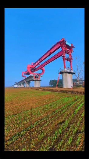 Real Engineerings | Engineering & Technology & Gadgets & DIY on Instagram: "Bridging the Gap: The Iron Giant at Work! 🌉🏗️ ​Meet the "Bridge Girder Launcher," a massive piece of machinery that literally builds the road it travels on! This self-launching gantry is revolutionizing how we build long-span bridges over difficult terrain. ​How to Build a Bridge in Mid-Air ​Instead of building expensive scaffolding from the ground up, this machine works from the top down: ​The Process (0:00 - 0:19): T