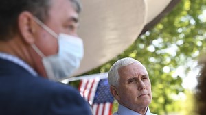 Face masks, worn and unworn, become political statement