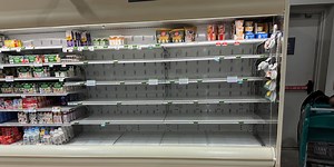 Grocery store shelves empty as shoppers try to stock up ahead of snowstorm