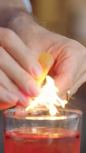 Elevate Negronis with a Fiery Citrus Garnish