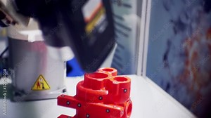 modern instrument measures a complex part with a laser beam.close-up