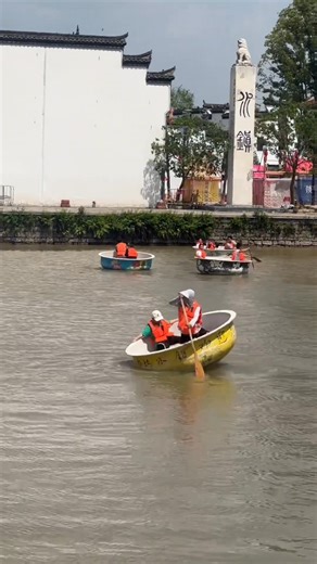 Immerse yourself in endless fun as you glide through the water of an ancient town on a "rocking boat". It's a delightful adventure filled with laughter! #boat #fun (cr: douyin 32845757387) | T-Time HK