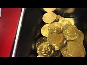 Retro Chuck E. Cheese's token dispenser