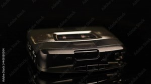 Pressing Play on Vintage Portable Cassette Tape Player From 1980s