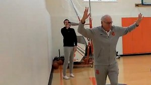 Jim Boeheim shows off his shooting skills