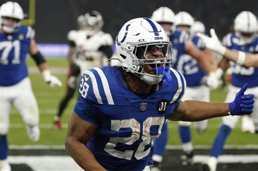 Colts’ Jonathan Taylor races past Falcons, into history books to help keep Indy atop AFC