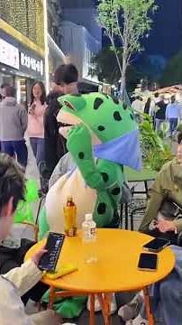 funny video of a man in a frog costume. part 2