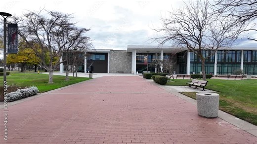 This walking POV captures CSU Stanislaus from eye level, revealing thoughtful campus design, open quads, and soft afternoon light shaping a balanced and approachable university environment.