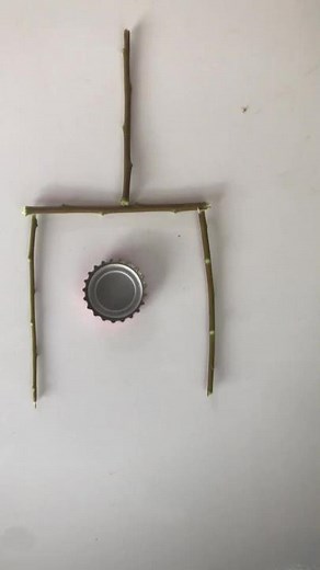 How to Manipulate a Bottle Cap on a Stick