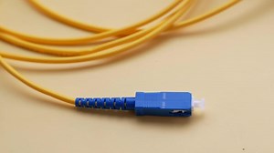 Download A yellow and blue cable with a yellow connector for free