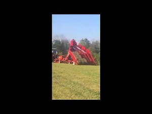 NH570 & Kuhns AE18 Accumulator: Helping a friend make hay