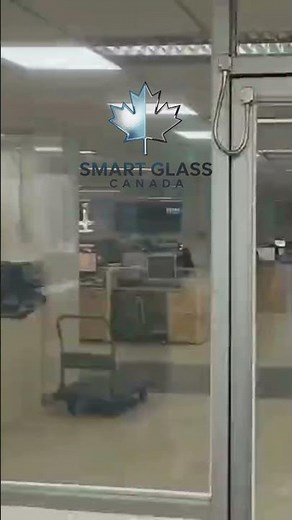 commercial hallway features large smart glass panels with smart film technology by SmartGlass Canada