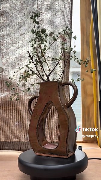 hand built vase I’m obsessed with how the glaze turned out on this red clay🏺✨#ceramics #pottery #vase #handbuilt #artistoftiktok