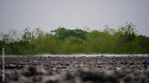 mud volcano with bursting bubble bledug kuwu. volcanic plateau with geothermal activity and geysers, slow motion Indonesia java. aerial view volcanic landscape