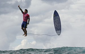 Brazilian Surfer Looks Like He's Flying In Incredible Olympic Photo