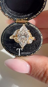 A gold and diamond leaflet cathedral frame the custom cut marquise diamond in one of my favorite collection pieces. Our latticework petal prongs twist around the basket, an everlasting flower for the nature loving soul🌷 #labdiamond #moissanite #floralengagementrings #engagementring #engagementrings #engagementringtips #natureinspiredengagementrings #engagementringideas #ovalengagementring #ovaldiamond #tulipengagementrings #latticeworkpetalprongs Lab Diamond engagement rings Engagement ring ide