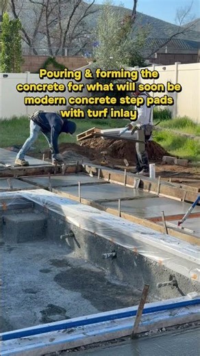 pouring the concrete for what will soon be modern concrete step pads with turf inlay