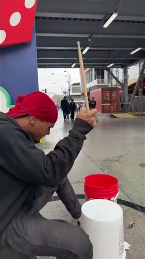 RED Bucket Drumming Street Performing Busking on Fremont Street In Downtown Las Vegas